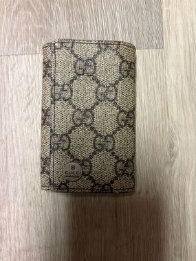 Authentic Gucci Beige & Brown Monogram Key Holder with cash holder